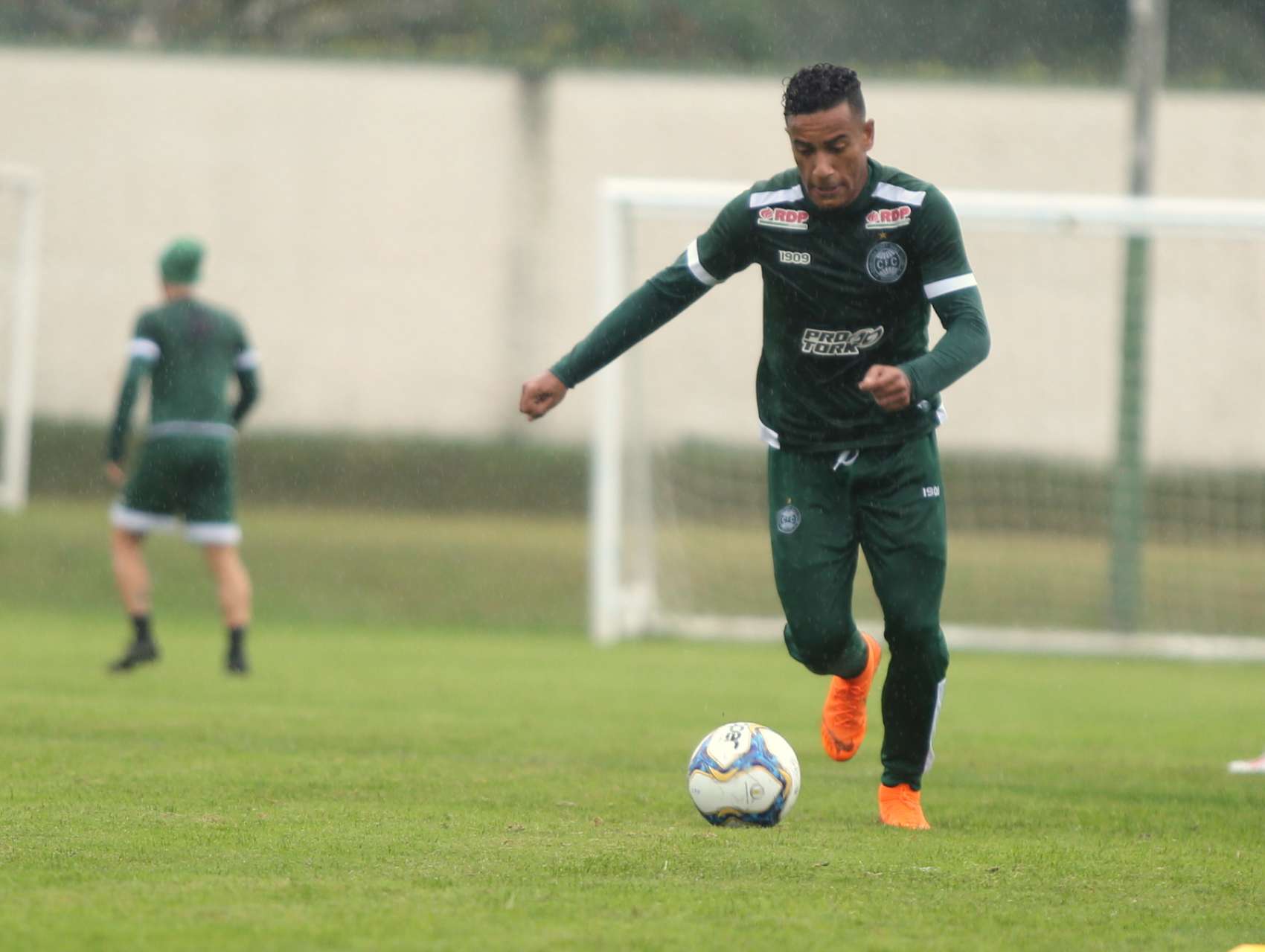 Fotos do treino na chuva